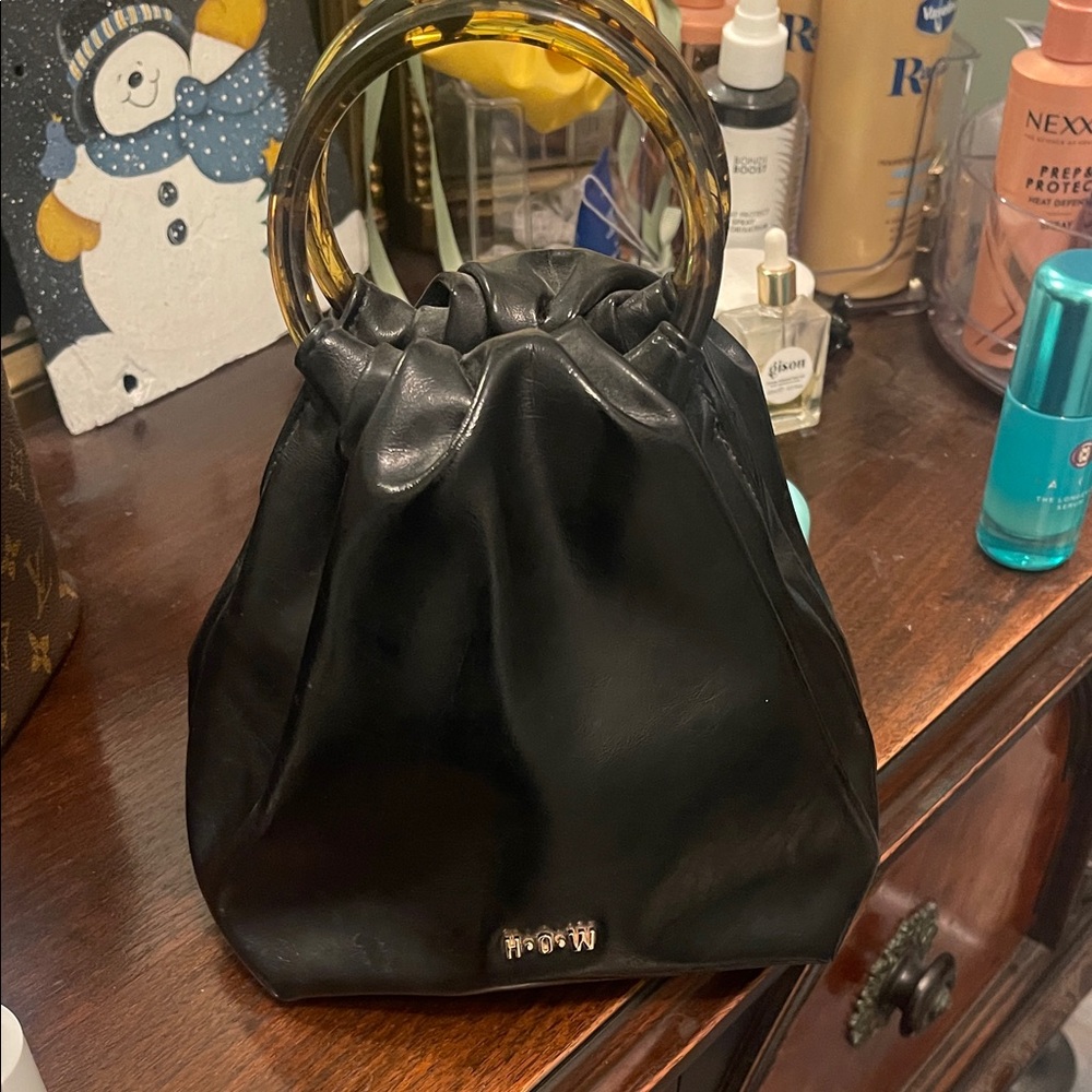 Stylish Black Mini Bag with Gold Accents